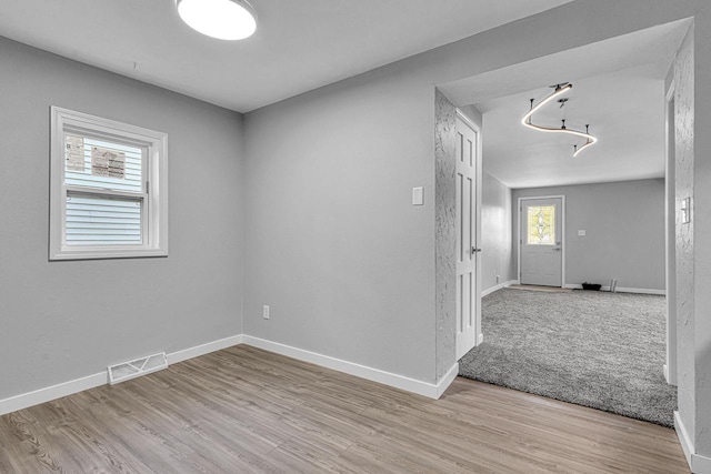 1629 Kentucky Ave, Sheboygan, WI 53081 - empty room with wood finished floors and baseboards