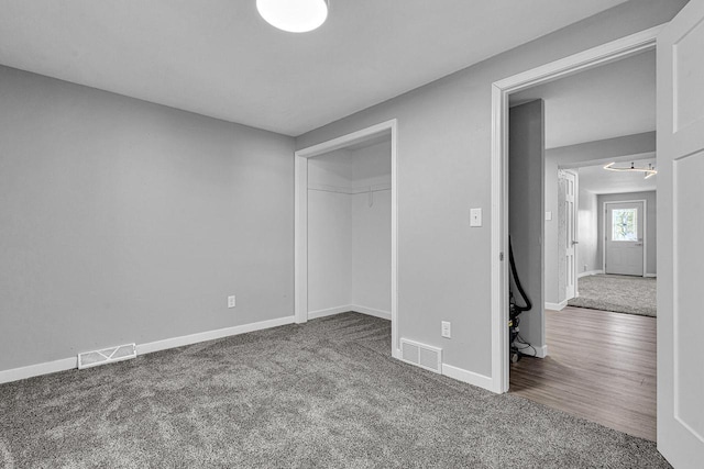 1629 Kentucky Ave, Sheboygan, WI 53081 - unfurnished bedroom with carpet flooring, baseboards, and a closet
