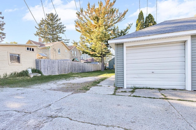 1629 Kentucky Ave, Sheboygan, WI 53081 - garage with fence and concrete driveway