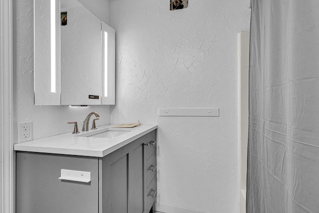 1629 Kentucky Ave, Sheboygan, WI 53081 - full bathroom featuring a textured wall and vanity