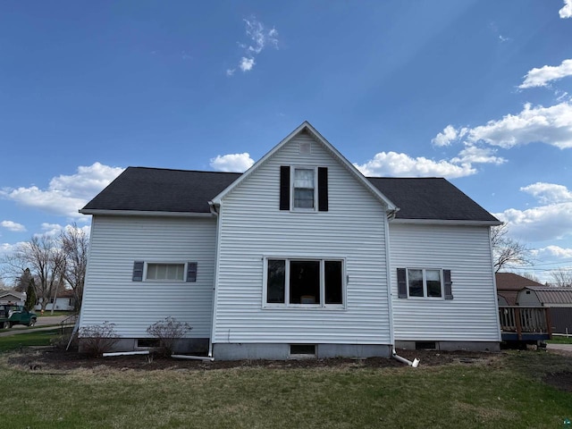 413 E 14th Ave, Ashland, WI 54806 - rear view of house with a lawn and a shingled roof