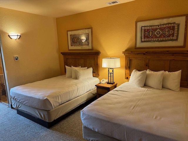 2504 River Rd Unit 7105, Wisconsin Dells, WI 53965 - carpeted bedroom featuring a textured wall