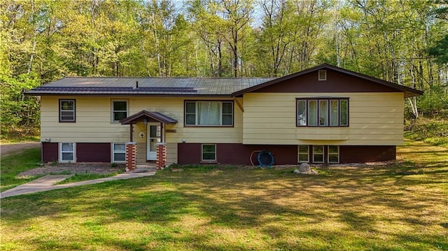 10148 Mcclaine Rd, Hayward, WI 54843 - bi-level home with a front yard and metal roof