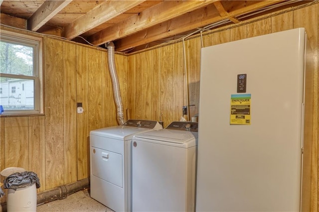 10148 Mcclaine Rd, Hayward, WI 54843 - washroom featuring independent washer and dryer and wooden walls