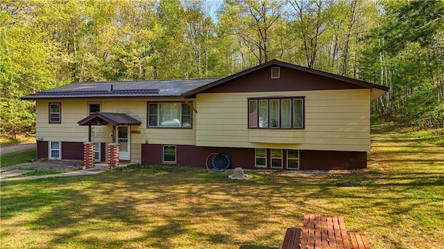 10148 Mcclaine Rd, Hayward, WI 54843 - raised ranch with a front lawn and metal roof