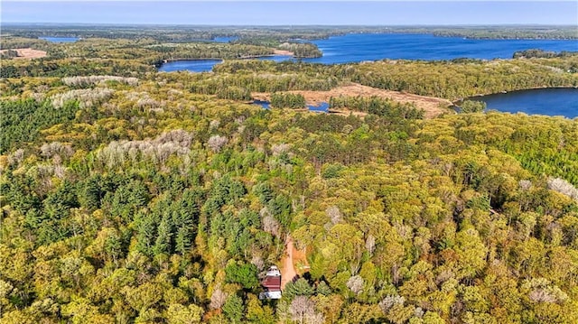 10148 Mcclaine Rd, Hayward, WI 54843 - aerial view of property and surrounding area with a heavily wooded area and a nearby body of water