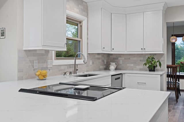 S58W22640 Glengarry Rd, Waukesha, WI 53189 - kitchen featuring a sink, white cabinetry, backsplash, and wood finished floors