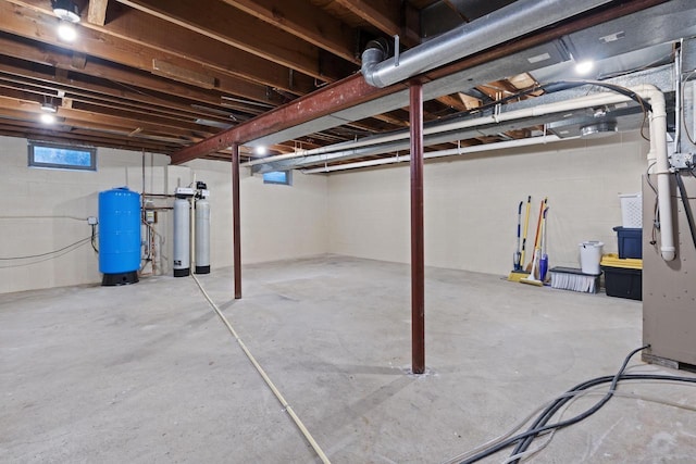S58W22640 Glengarry Rd, Waukesha, WI 53189 - below grade area featuring a water pressure tank and a water softener system