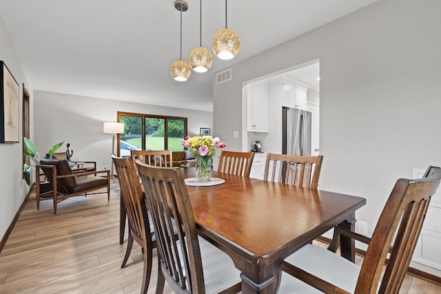 S58W22640 Glengarry Rd, Waukesha, WI 53189 - dining room with light wood-style flooring