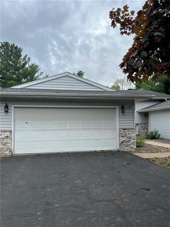 1123 Glades Dr, Altoona, WI 54720 - garage featuring asphalt driveway