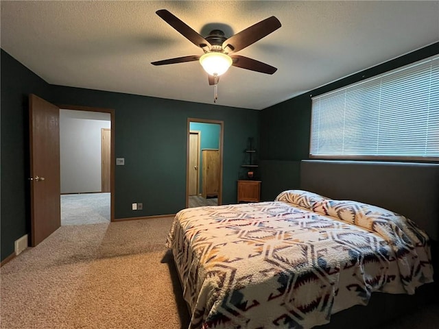 1123 Glades Dr, Altoona, WI 54720 - bedroom with carpet flooring, ceiling fan, and a textured ceiling