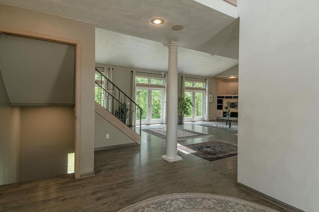 W6504 Klassy Rd, New Glarus, WI 53574 - foyer entrance with decorative columns, wood finished floors, baseboards, stairs, and recessed lighting