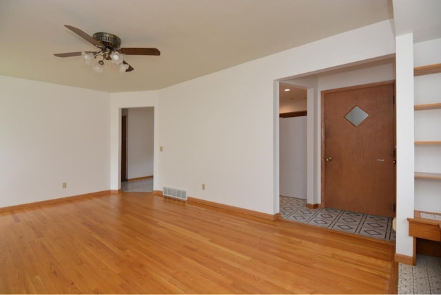 4802 Meredithe Ave, Madison, WI 53716 - spare room featuring light wood-type flooring, a ceiling fan, and baseboards