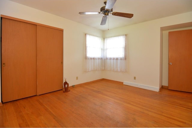 4802 Meredithe Ave, Madison, WI 53716 - unfurnished bedroom featuring light wood-style floors, a closet, baseboards, and a ceiling fan