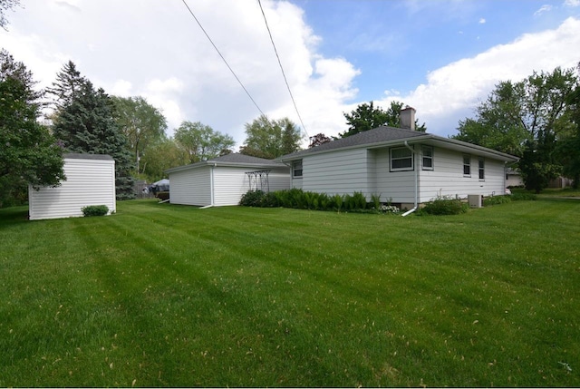 4802 Meredithe Ave, Madison, WI 53716 - view of green lawn featuring central AC unit