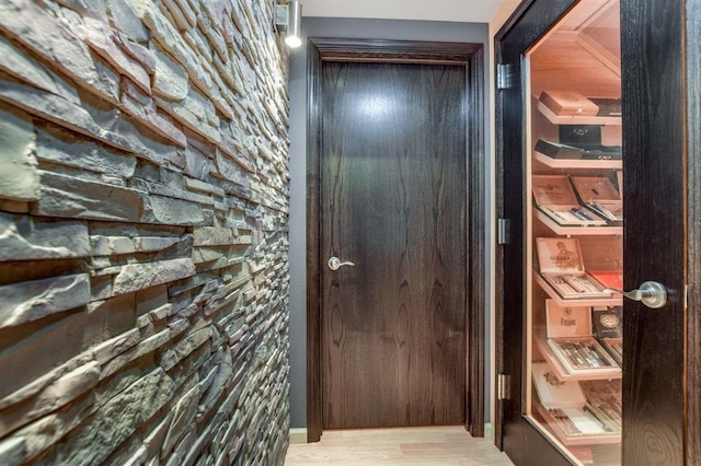 9121 Blackhawk Rd, Middleton, WI 53562 - corridor featuring wood finished floors