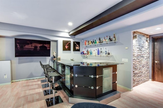 9121 Blackhawk Rd, Middleton, WI 53562 - indoor dry bar featuring wood finished floors, recessed lighting, and baseboards