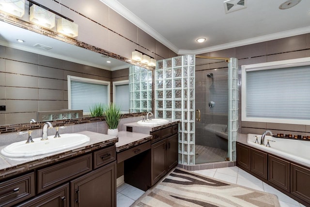 9121 Blackhawk Rd, Middleton, WI 53562 - full bathroom with tile patterned floors, crown molding, a stall shower, a bath, and vanity