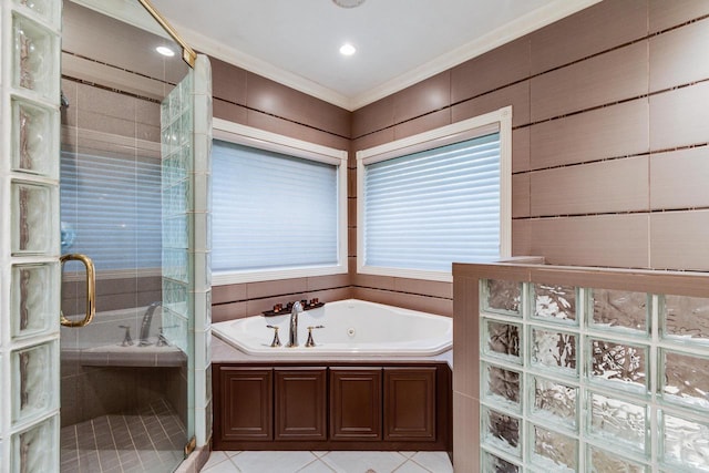 9121 Blackhawk Rd, Middleton, WI 53562 - bathroom with a tub with jets, tile patterned floors, a stall shower, and crown molding