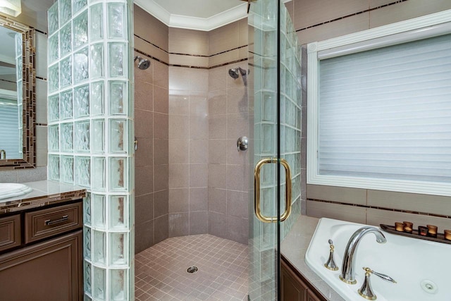 9121 Blackhawk Rd, Middleton, WI 53562 - bathroom featuring a stall shower, a tub with jets, and vanity