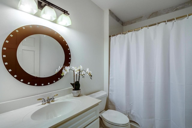9121 Blackhawk Rd, Middleton, WI 53562 - bathroom featuring vanity, toilet, and curtained shower