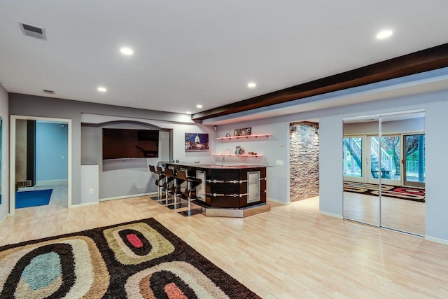 9121 Blackhawk Rd, Middleton, WI 53562 - indoor wet bar featuring light wood-style floors, recessed lighting, baseboards, and beamed ceiling