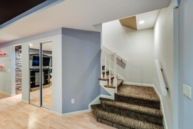 9121 Blackhawk Rd, Middleton, WI 53562 - stairs featuring wood finished floors, recessed lighting, and baseboards