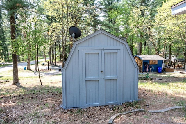 2065 Maple St, Friendship, WI 53934 - view of shed with view of wooded area
