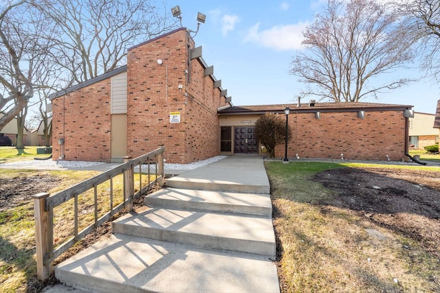 8735 N 72nd St Unit 202, Milwaukee, WI 53223 - view of front of house featuring brick siding