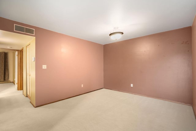 8735 N 72nd St Unit 202, Milwaukee, WI 53223 - empty room with light carpet and baseboards