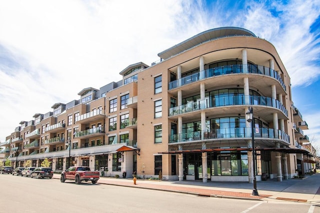 215 E Pleasant St Unit 201, Oconomowoc, WI 53066 - view of apartment building / complex