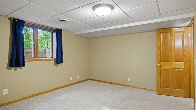 E3313 Jennifer Ln, Eau Claire, WI 54701 - below grade area featuring baseboards, carpet flooring, and a drop ceiling