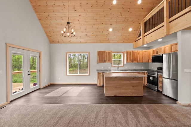 2806 3rd Ct, Oxford, WI 53952 - kitchen featuring appliances with stainless steel finishes, high vaulted ceiling, wood ceiling, a kitchen island, and healthy amount of natural light