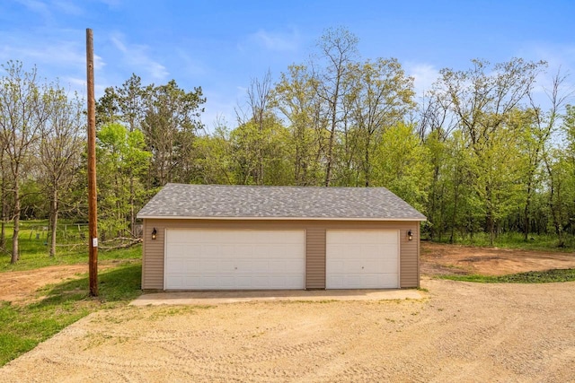 2806 3rd Ct, Oxford, WI 53952 - detached garage with a view of trees