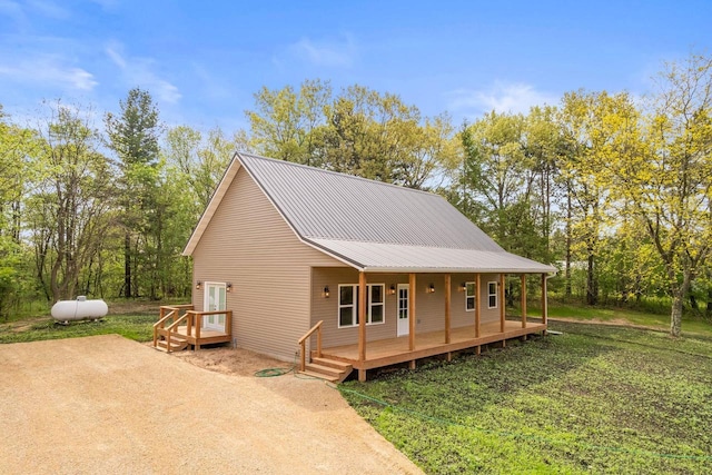 2806 3rd Ct, Oxford, WI 53952 - view of front of home with metal roof and a front lawn