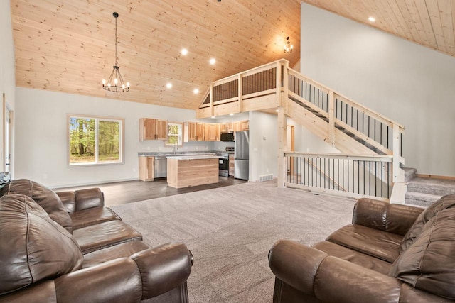 2806 3rd Ct, Oxford, WI 53952 - living area featuring high vaulted ceiling, wood ceiling, a chandelier, recessed lighting, and stairway