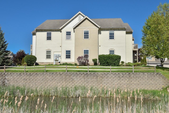 view of front of home with a front lawn