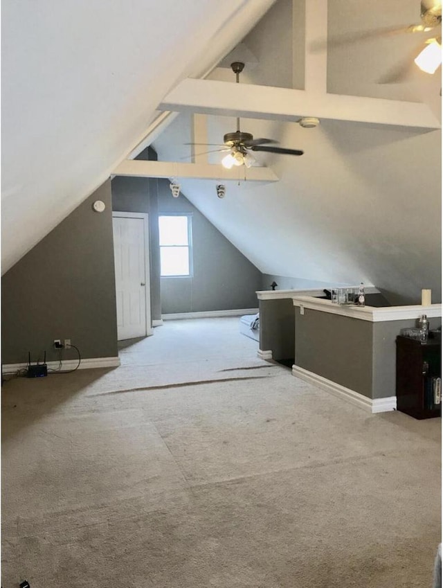 812 E Clarke St Unit 814, Milwaukee, WI 53212 - bonus room with ceiling fan, lofted ceiling, light colored carpet, and baseboards