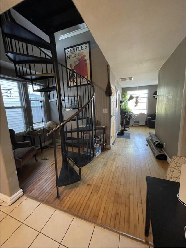 812 E Clarke St Unit 814, Milwaukee, WI 53212 - stairs with baseboards and hardwood / wood-style flooring