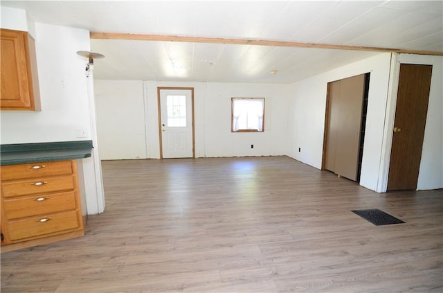 W2585 County Road R, Durand, WI 54736 - unfurnished living room featuring light wood-style floors
