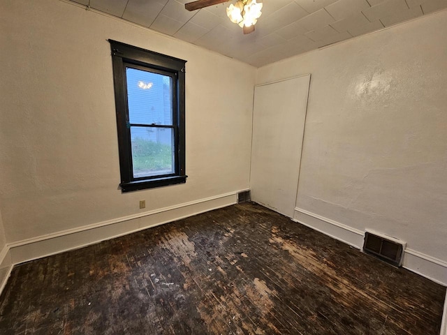 308 W Prospect St, Endeavor, WI 53930 - empty room featuring wood-type flooring, ceiling fan, and baseboards