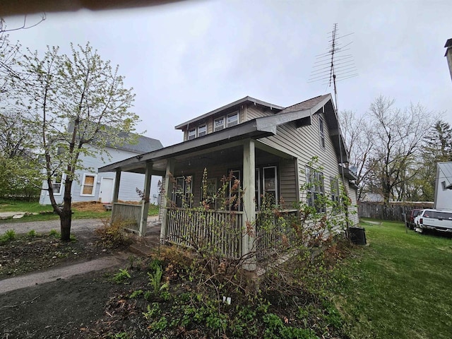 308 W Prospect St, Endeavor, WI 53930 - view of property exterior featuring a porch and a yard