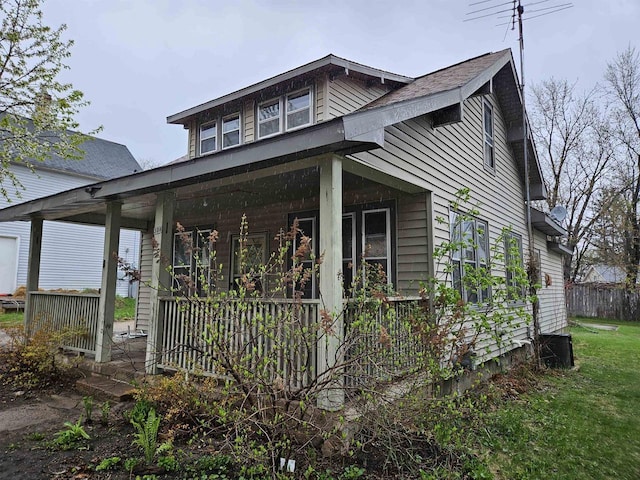 308 W Prospect St, Endeavor, WI 53930 - view of property exterior with covered porch and central AC