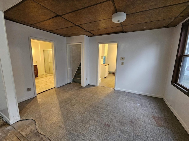 308 W Prospect St, Endeavor, WI 53930 - empty room featuring stairway and baseboards