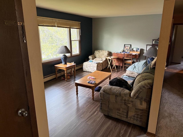 220-222 Lincoln St, Brooklyn, WI 53521 - living area featuring wood finished floors and a baseboard radiator