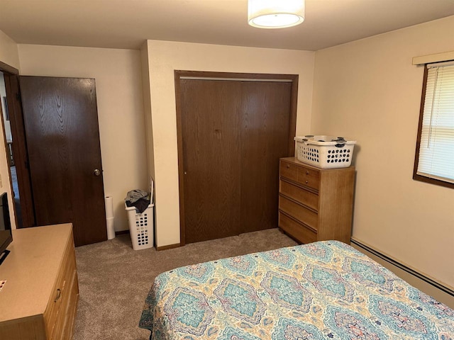 220-222 Lincoln St, Brooklyn, WI 53521 - bedroom with a baseboard heating unit, carpet floors, and a closet