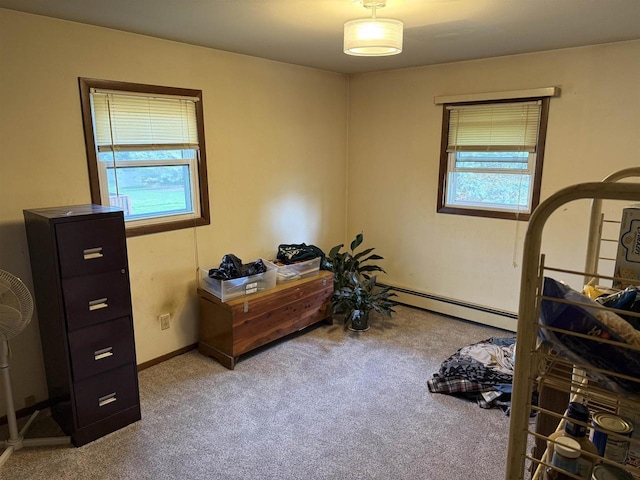 220-222 Lincoln St, Brooklyn, WI 53521 - carpeted bedroom with multiple windows, a baseboard radiator, and baseboards