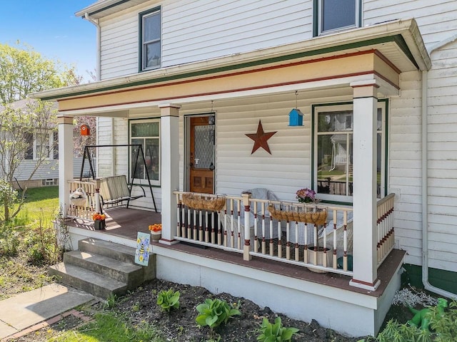 610 W Franklin St, Portage, WI 53901 - view of exterior entry with a porch