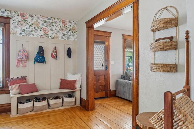 610 W Franklin St, Portage, WI 53901 - mudroom featuring wallpapered walls and hardwood / wood-style floors