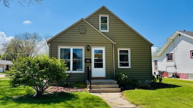 2377 S 73rd St, West Allis, WI 53219 - bungalow featuring a front lawn